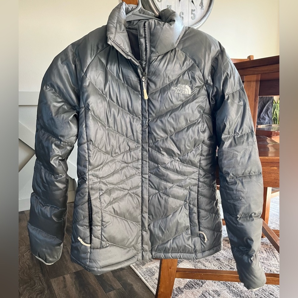 The North Face zip up silver winter jacket. Size small